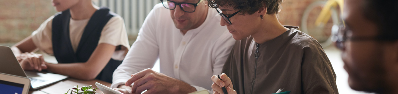 Close up of two employees monitoring energy usage