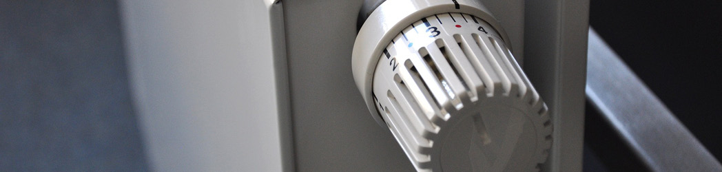 An image of a heating thermostat turned down to reduce energy usage