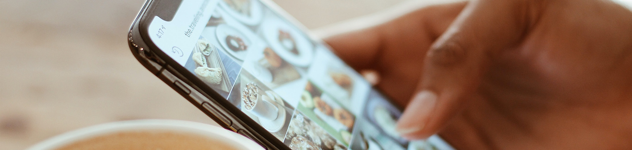 Closeup of someone scrolling through their social media feed