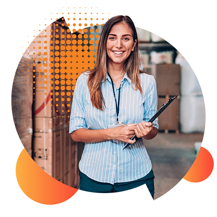 Female business owner in a warehouse, reviewing her businesses commercial energy rates