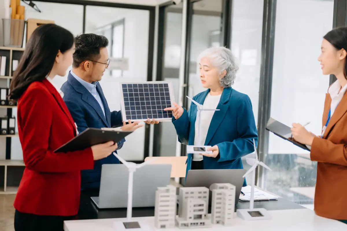 a business meeting about green energy sources taking place in a light and modern office setting