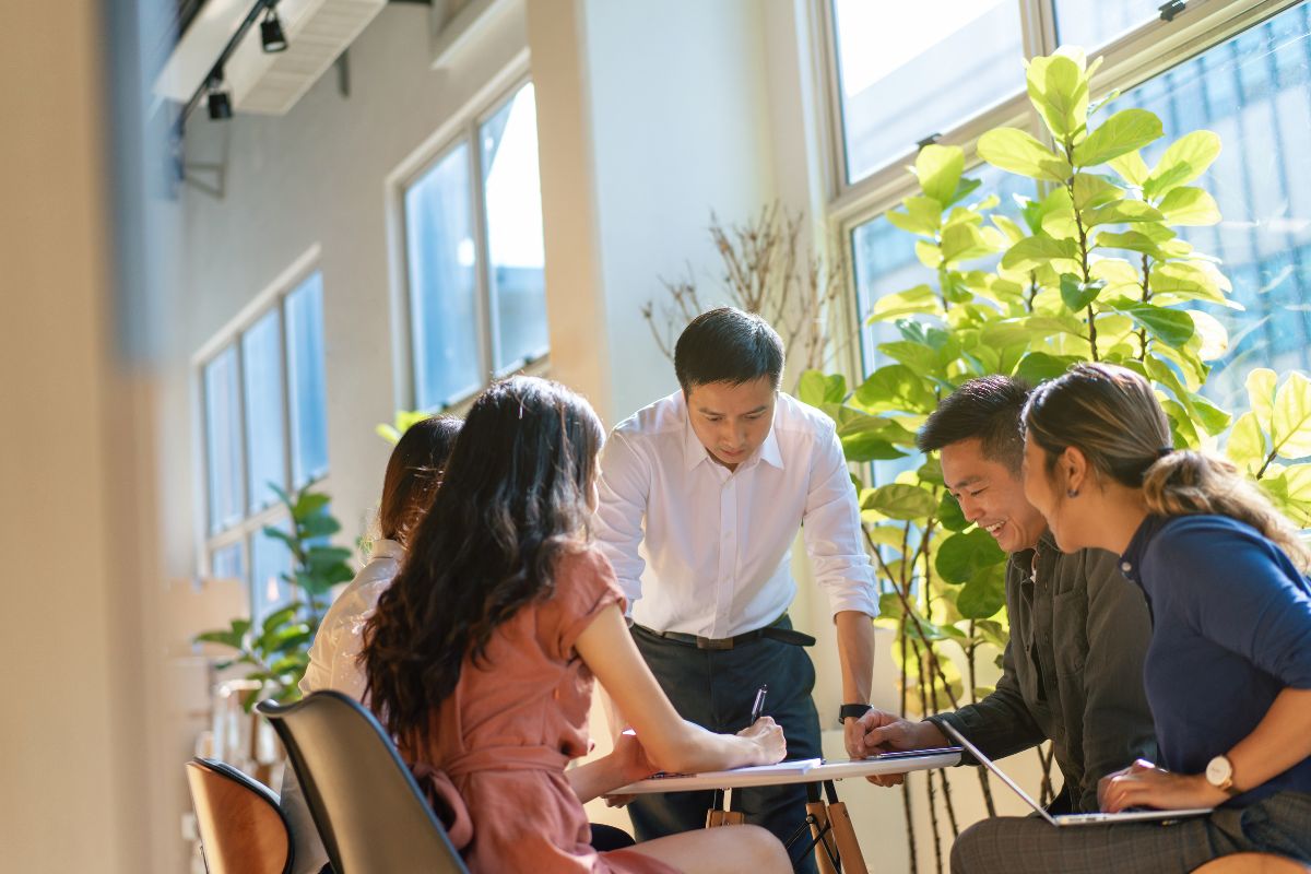office workers having a net zero meeting