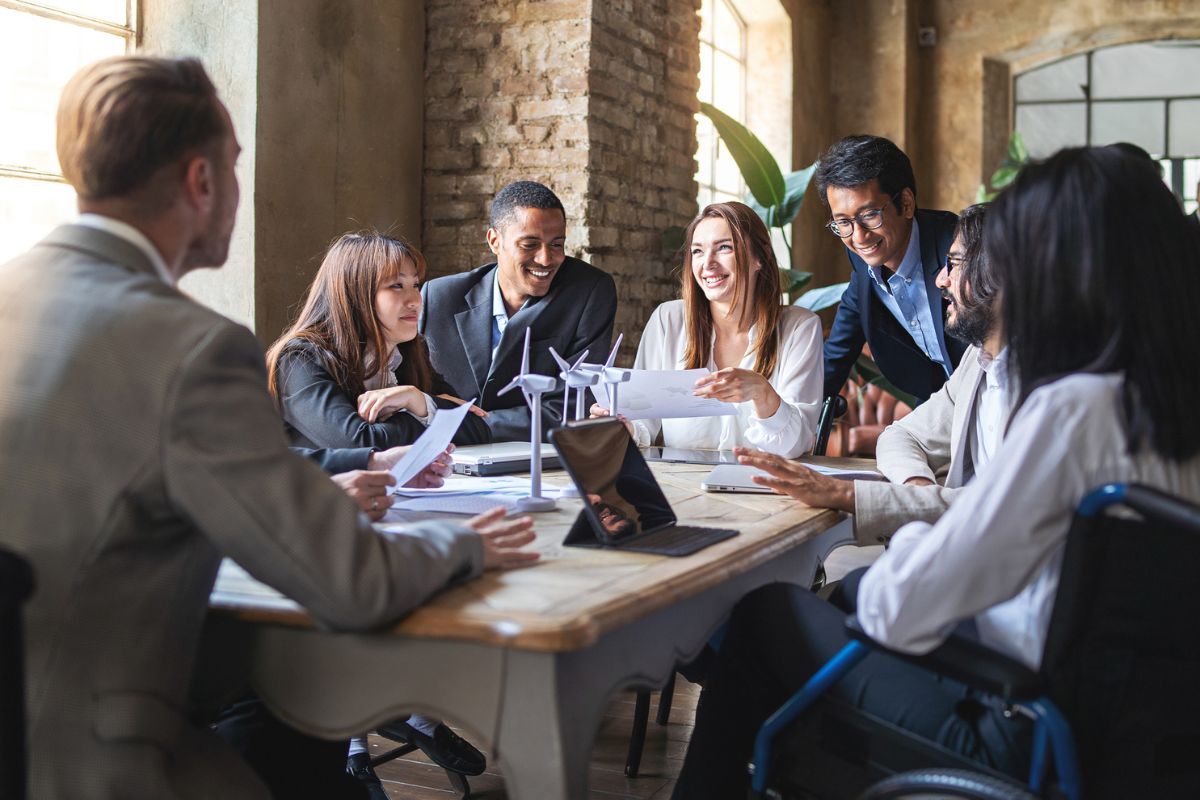 employees having a meeting to discuss energy saving