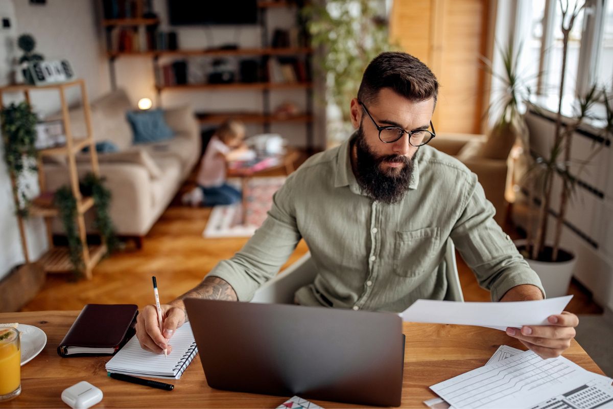 business owner looking at his energy bills