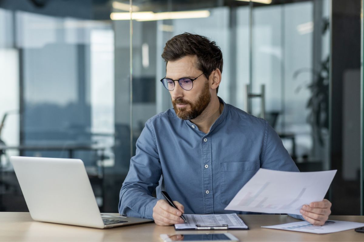 business owner looking at commercial energy rates