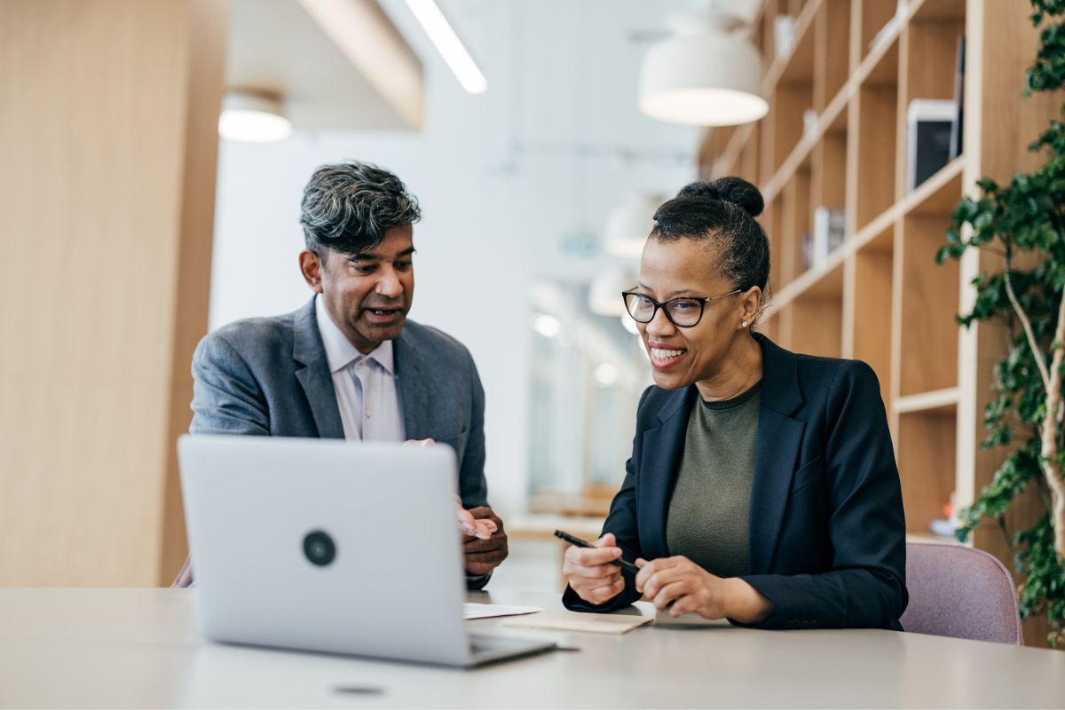 business owner and ppa representative discussing contracts