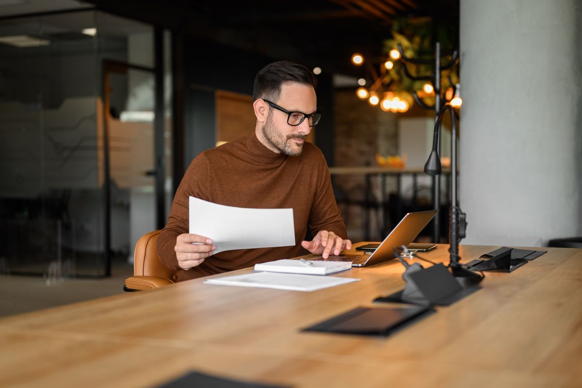 business owner looking at business energy contracts